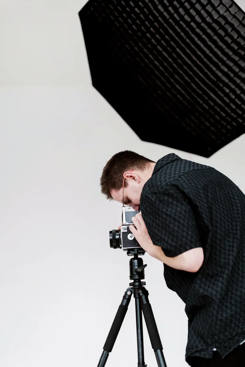 Photographer shooting product photos in studio for a website